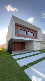 Casa Exclusiva com 4 Suítes e Área Gourmet à Venda no Alphaville Litoral Norte 2