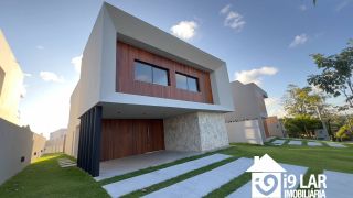 Casa Exclusiva com 4 Suítes e Área Gourmet à Venda no Alphaville Litoral Norte 2