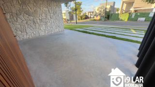 Casa Exclusiva com 4 Suítes e Área Gourmet à Venda no Alphaville Litoral Norte 2