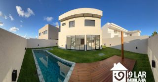 Casa Exclusiva com 4 Suítes e Área Gourmet à Venda no Alphaville Litoral Norte 2