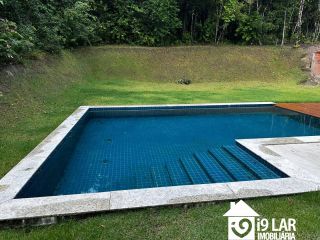 Sofisticação e Lazer em Praia do Forte: Casa de 5 Suítes com Piscina Espetacular no Ilha dos Pássaros