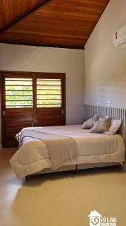 Refúgio de Luxo em Praia do Forte: Casa Design com 6 Suítes, Piscina de 65m² e Privacidade Absoluta