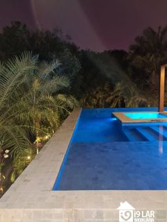 Refúgio de Luxo em Praia do Forte: Casa Design com 6 Suítes, Piscina de 65m² e Privacidade Absoluta