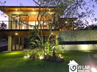 Refúgio de Luxo em Praia do Forte: Casa Design com 6 Suítes, Piscina de 65m² e Privacidade Absoluta