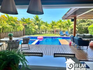 Seu Paraíso Particular em Praia do Forte: Casa Mobiliada e Decorada com 6 Suítes no Condomínio Piscinas Naturais