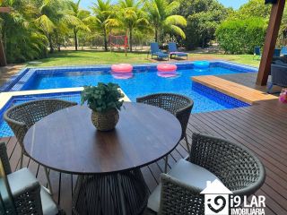 Seu Paraíso Particular em Praia do Forte: Casa Mobiliada e Decorada com 6 Suítes no Condomínio Piscinas Naturais
