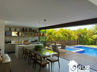 Seu Paraíso Particular em Praia do Forte: Casa Mobiliada e Decorada com 6 Suítes no Condomínio Piscinas Naturais