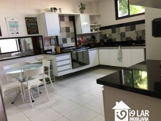 Um Paraíso Particular: Mansão Espetacular com 6 Quartos no Condomínio Encontro das Águas