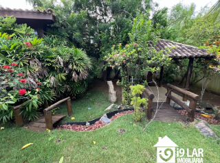 Sofisticação no Itaigara: Casa de Rua com 4 Suítes, Lazer Completo e Acabamento Premium