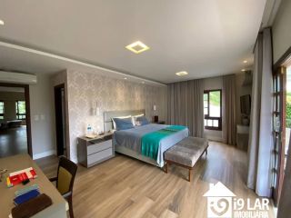 Design e Amplitude no Itaigara: Casa Duplex com Pé Direito Duplo e 3 Suítes Imensas