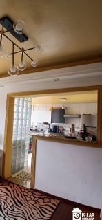 Apartamento Sofisticado com Iluminação Planejada, 2 Quartos e Semi-Mobiliado