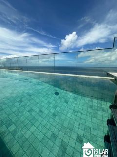 Apartamento 2 suítes na Barra com vista mar, andar alto e 2 vagas no Signature