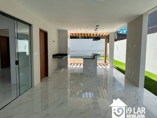 Casa moderna 4 suítes no Alphaville Litoral Norte 1, 280m², pé-direito duplo e área gourmet integrada