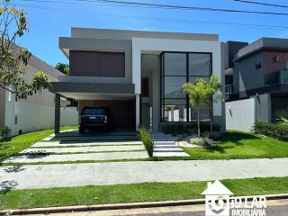 Casa moderna 4 suítes no Alphaville Litoral Norte 1, 280m², pé-direito duplo e área gourmet integrada