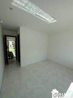 Casa moderna 4 suítes no Alphaville Litoral Norte 1, 280m², pé-direito duplo e área gourmet integrada