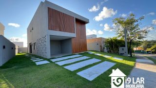 Casa 4 suítes no Alphaville Litoral Norte 2, 294m², pé-direito duplo, piscina e arquitetura moderna