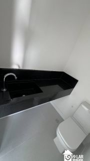 Casa 4 suítes no Alphaville Litoral Norte 2, 294m², pé-direito duplo, piscina e arquitetura moderna