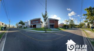 Casa 4 suítes no Alphaville Litoral Norte 2, 294m², pé-direito duplo, piscina e arquitetura moderna