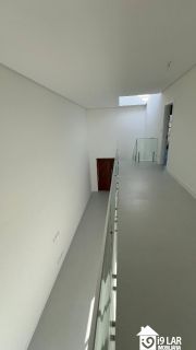 Casa 4 suítes no Alphaville Litoral Norte 2, 294m², pé-direito duplo, piscina e arquitetura moderna