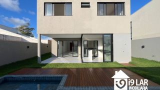 Casa 4 suítes no Alphaville Litoral Norte 2, 294m², pé-direito duplo, piscina e arquitetura moderna