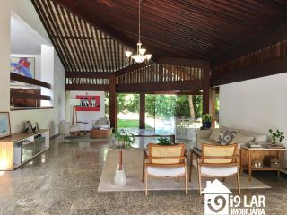Casa 6/4 no Encontro das Águas com 900m² construídos, terreno de 5.400m², área verde e lazer completo