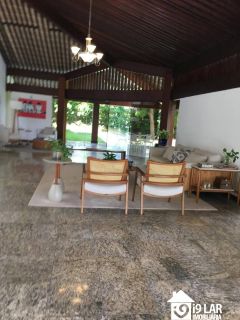 Casa 6/4 no Encontro das Águas com 900m² construídos, terreno de 5.400m², área verde e lazer completo