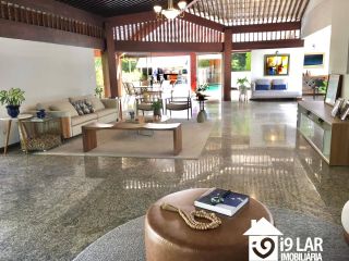 Casa 6/4 no Encontro das Águas com 900m² construídos, terreno de 5.400m², área verde e lazer completo