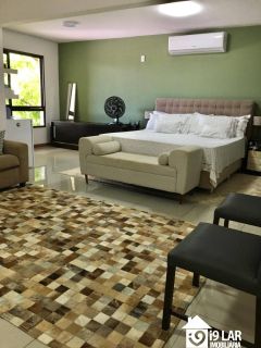 Casa 6/4 no Encontro das Águas com 900m² construídos, terreno de 5.400m², área verde e lazer completo