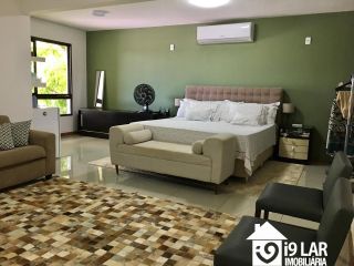 Casa 6/4 no Encontro das Águas com 900m² construídos, terreno de 5.400m², área verde e lazer completo