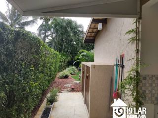 Casa 6 suítes em Busca Vida, 480m², terreno de 1.000m², energia solar e acesso à praia