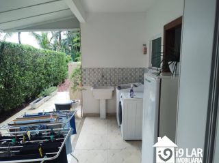 Casa 6 suítes em Busca Vida, 480m², terreno de 1.000m², energia solar e acesso à praia