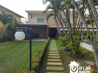 Casa 6 suítes em Busca Vida, 480m², terreno de 1.000m², energia solar e acesso à praia