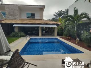 Casa 6 suítes em Busca Vida, 480m², terreno de 1.000m², energia solar e acesso à praia