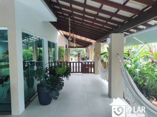 Casa 6 suítes em Busca Vida, 480m², terreno de 1.000m², energia solar e acesso à praia