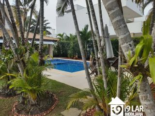 Casa 6 suítes em Busca Vida, 480m², terreno de 1.000m², energia solar e acesso à praia