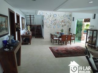Casa 6 suítes em Busca Vida, 480m², terreno de 1.000m², energia solar e acesso à praia