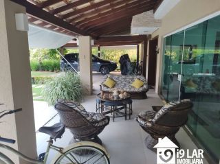 Casa 6 suítes em Busca Vida, 480m², terreno de 1.000m², energia solar e acesso à praia