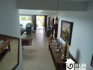 Casa 6 suítes em Busca Vida, 480m², terreno de 1.000m², energia solar e acesso à praia