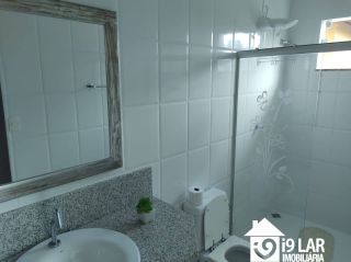 Casa 6 suítes em Busca Vida, 480m², terreno de 1.000m², energia solar e acesso à praia