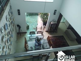 Casa 6 suítes em Busca Vida, 480m², terreno de 1.000m², energia solar e acesso à praia