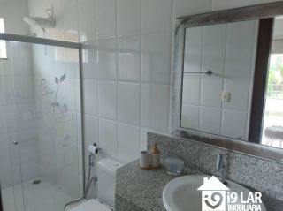 Casa 6 suítes em Busca Vida, 480m², terreno de 1.000m², energia solar e acesso à praia
