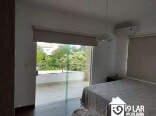 Casa 6 suítes em Busca Vida, 480m², terreno de 1.000m², energia solar e acesso à praia