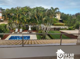 Casa 6 suítes em Busca Vida, 480m², terreno de 1.000m², energia solar e acesso à praia