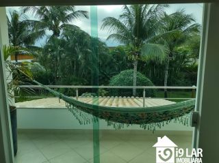 Casa 6 suítes em Busca Vida, 480m², terreno de 1.000m², energia solar e acesso à praia