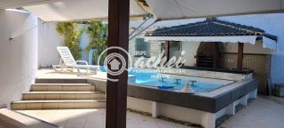 Casa para alugar no condomínio Atlantic Ville em  Buraquinho