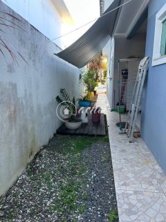 Casa Térrea 3/4, sendo 2 suítes- Priscila Dultra Locação em Buraquinho - Energia Solar
