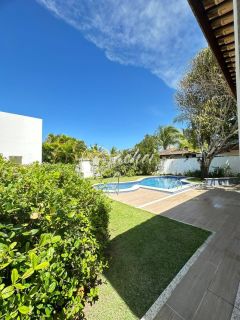 Casa alto padrão 5/4 em Busca Vida com piscina privativa