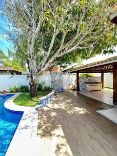 Casa alto padrão 5/4 em Busca Vida com piscina privativa