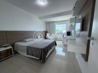 Casa em Alphaville Litoral Norte 1 com suíte no térreo