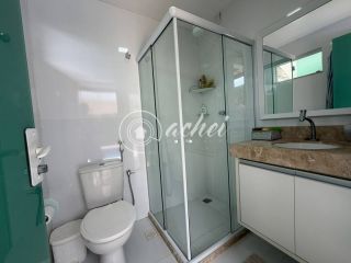 Casa em Alphaville Litoral Norte 1 com suíte no térreo